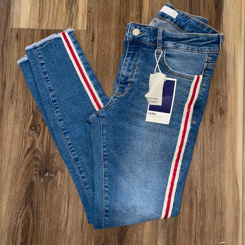 Brand new Zara size 6 retro, women’s jeans! Red stripe down the sides.